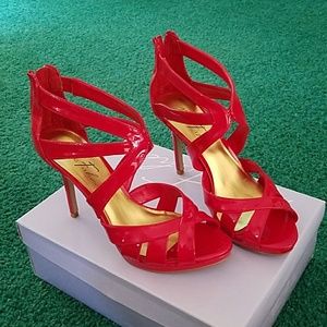 Red patent heels